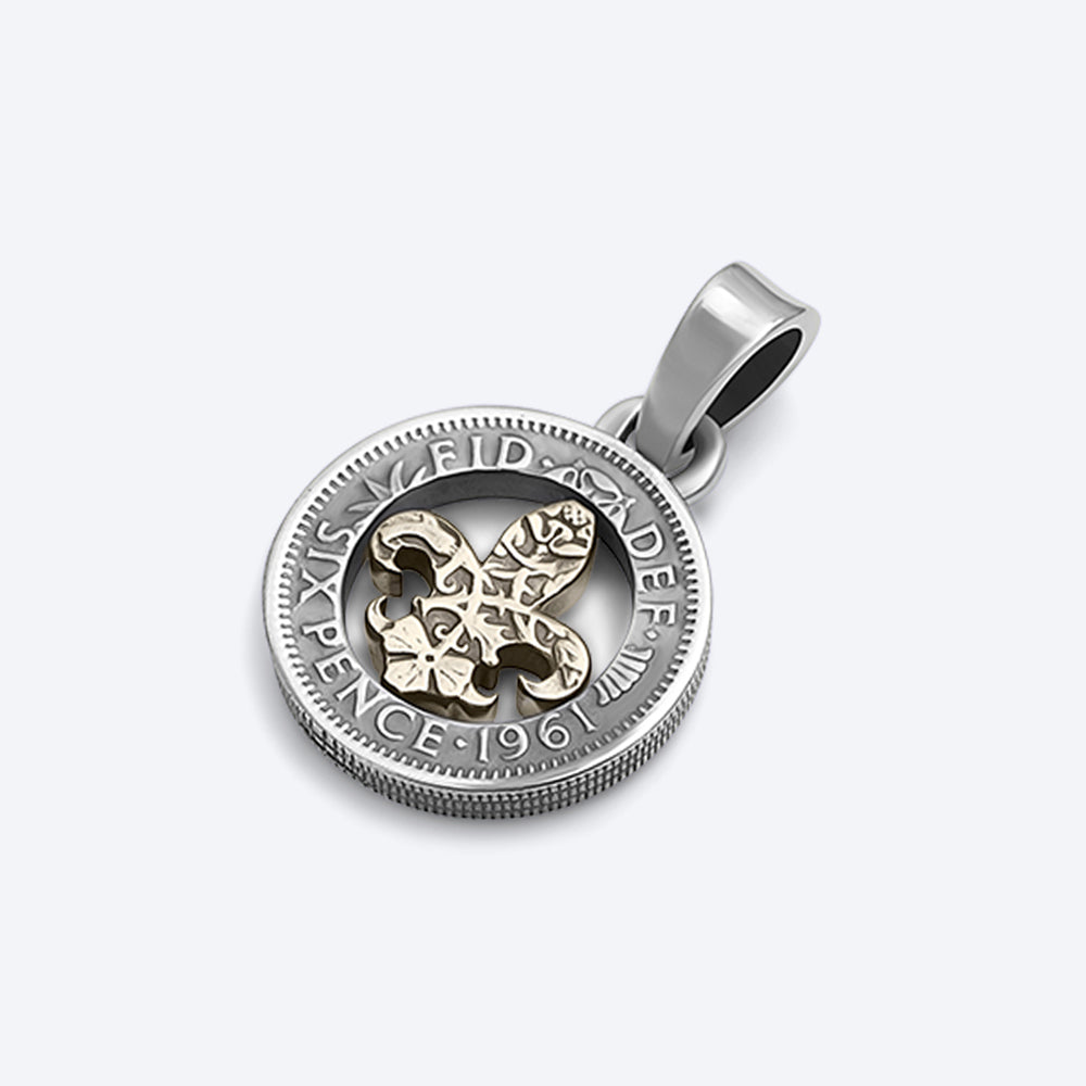 Fleur de lis coin pendant